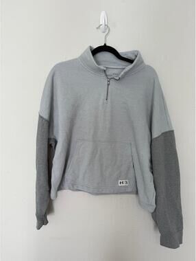 Under armour cropped 1/4 zip size large 
Small stain on front pocket
